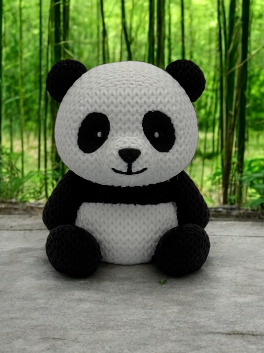 Knitted panda action figure