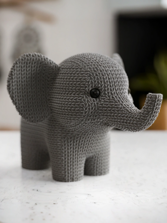Knitted elephant action figure